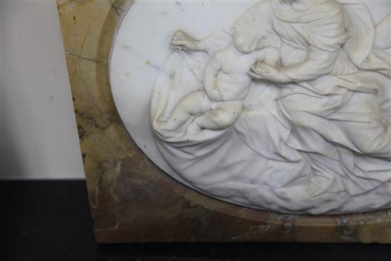 A 19th century Italian carved white marble relief plaque of The Holy Family, 19 x 15in.